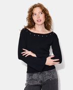 Pull avec œillets et manches flare