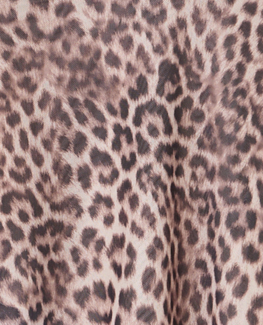 Top asymétrique en résille motif léopard