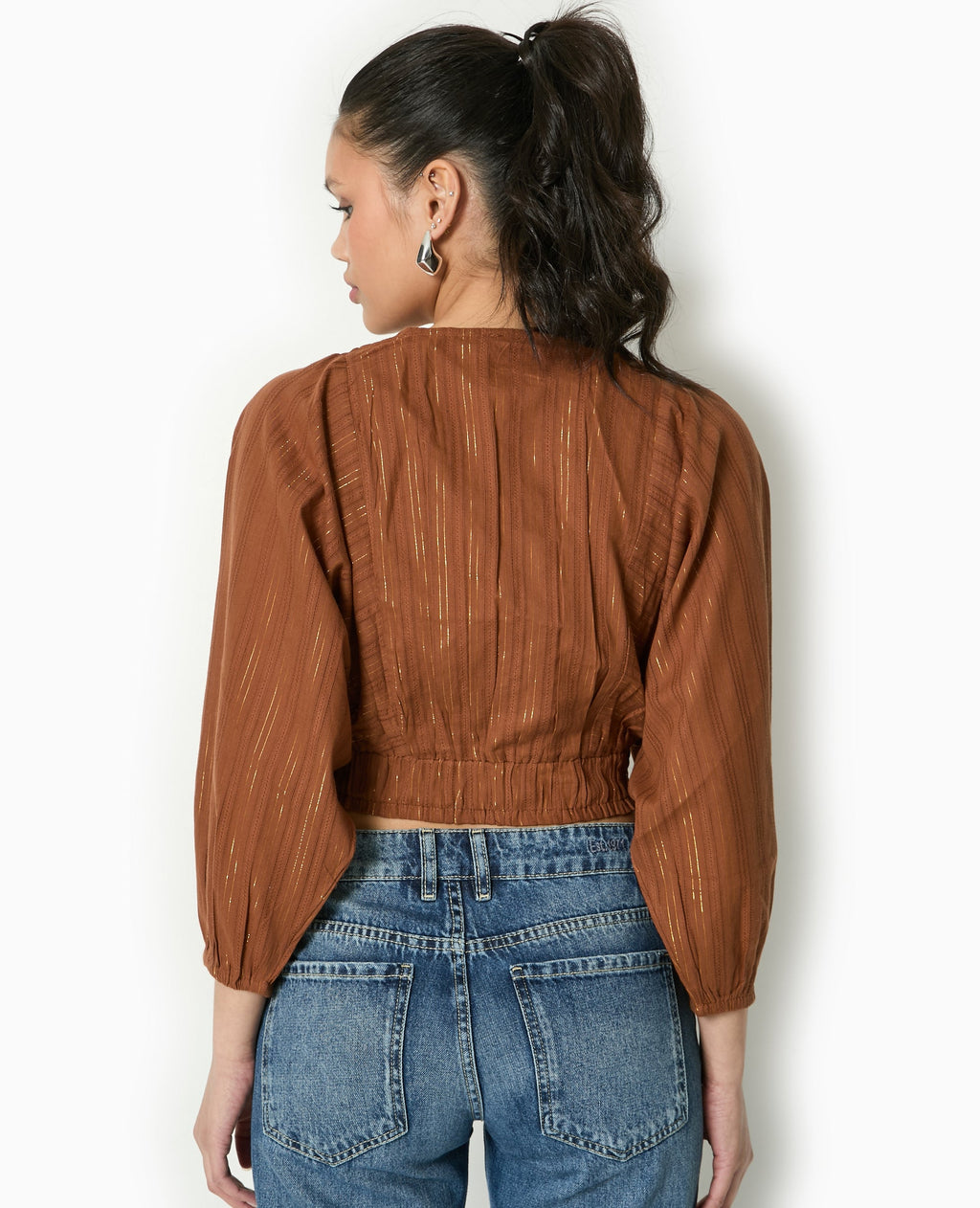 Blouse décolletée avec manches chauve-souris