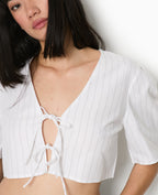 Blouse courte rayée avec nouettes