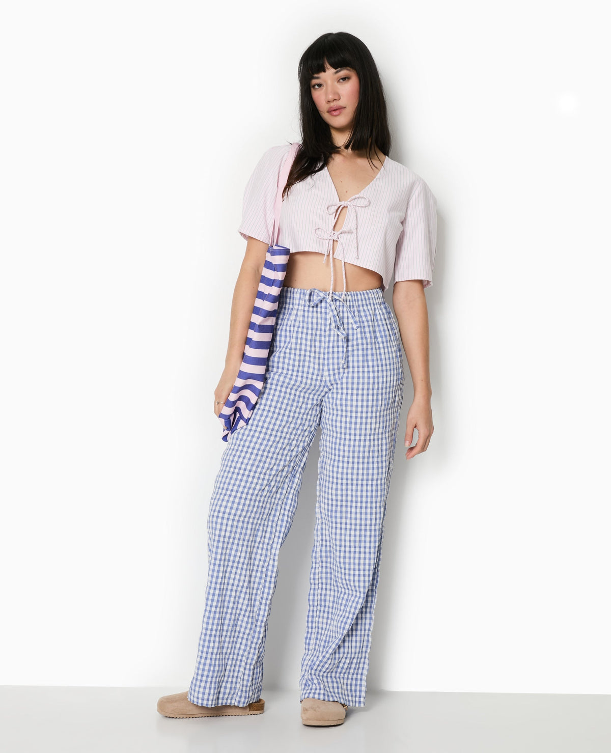 Blouse courte rayée avec nouettes