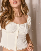 Blouse manches ballons avec finitions croquet