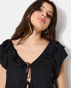 Blouse en voile avec volants et nouettes