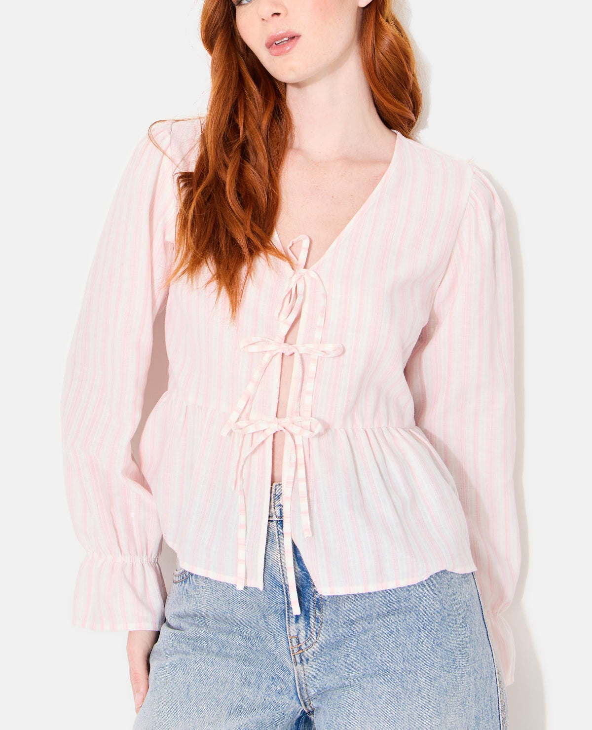 Blouse rayée avec volants et nouettes