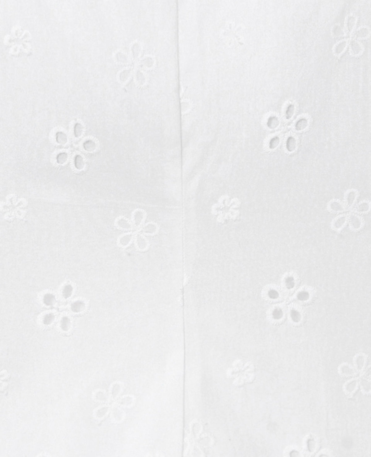 Top à bretelles avec fleurs en broderie anglaise
