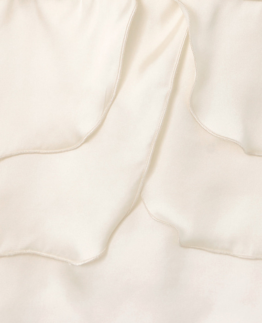 Top à bretelles en satin avec volants