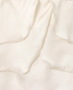 Top à bretelles en satin avec volants