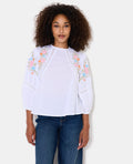 Blouse manches ballons avec broderies et dentelle