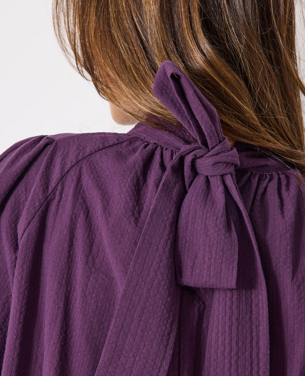 Blouse manches ballons et col à nouer