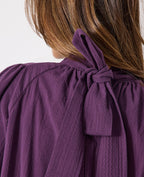 Blouse manches ballons et col à nouer