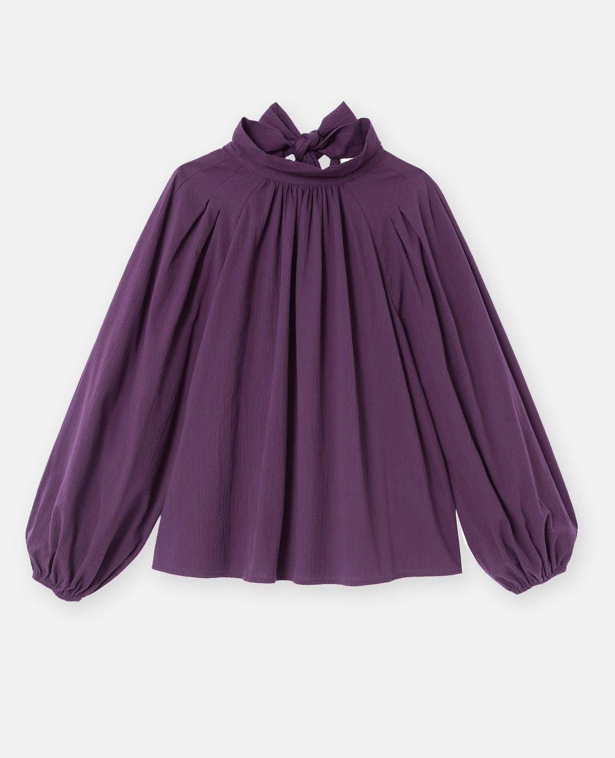 Blouse manches ballons et col à nouer