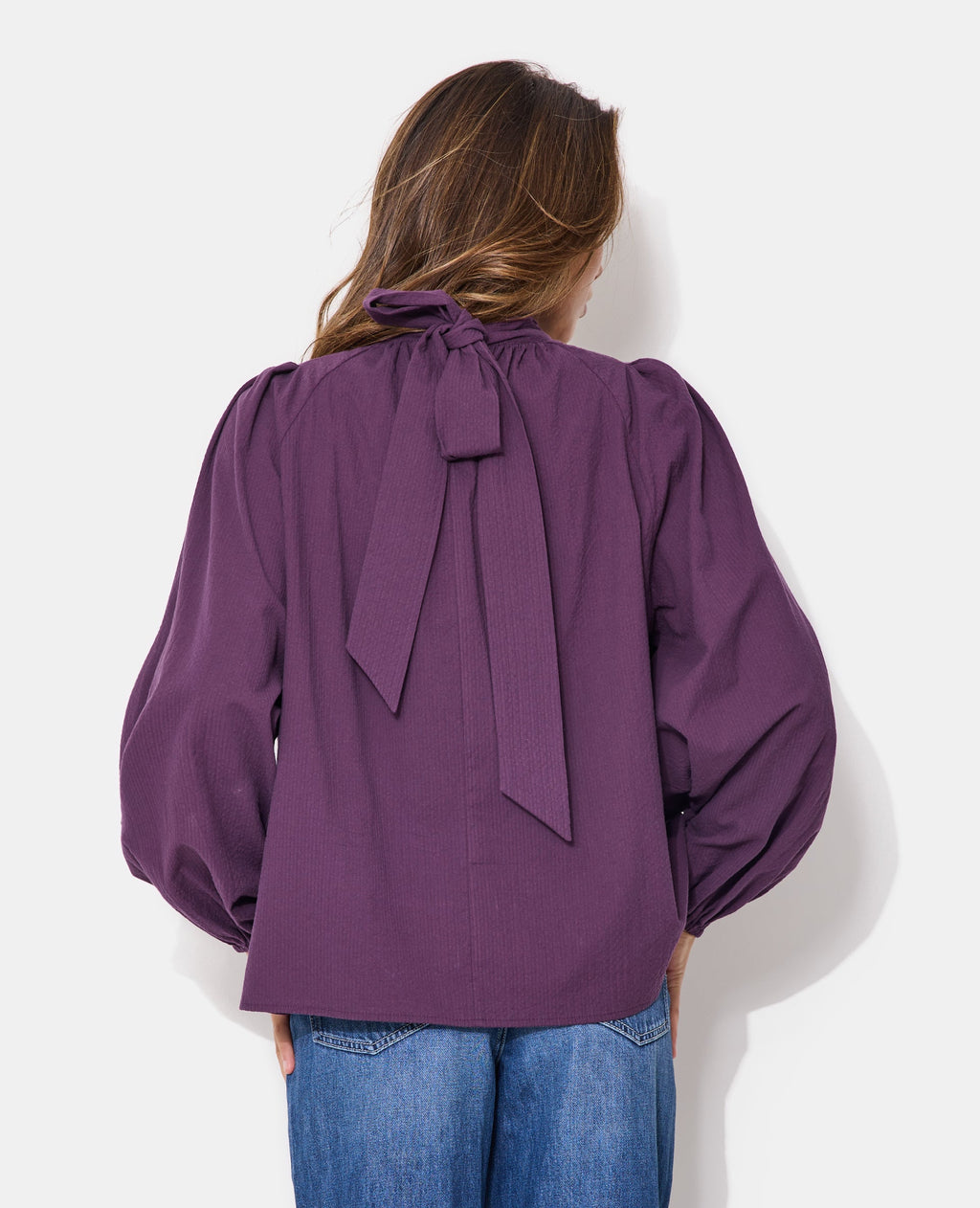 Blouse manches ballons et col à nouer