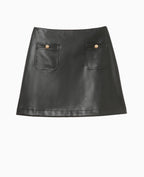 Mini-jupe en simili cuir avec poches