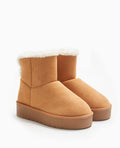 Boots fourrées en suédine