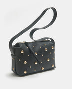 Sac boxy avec clous porté épaule