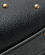 Sac boxy avec clous porté épaule