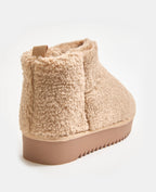Boots courtes en sherpa avec semelles crantées