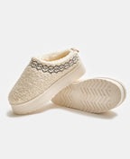 Mules en sherpa avec semelles compensées