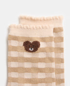 Paire de chaussettes à carreaux avec ourson