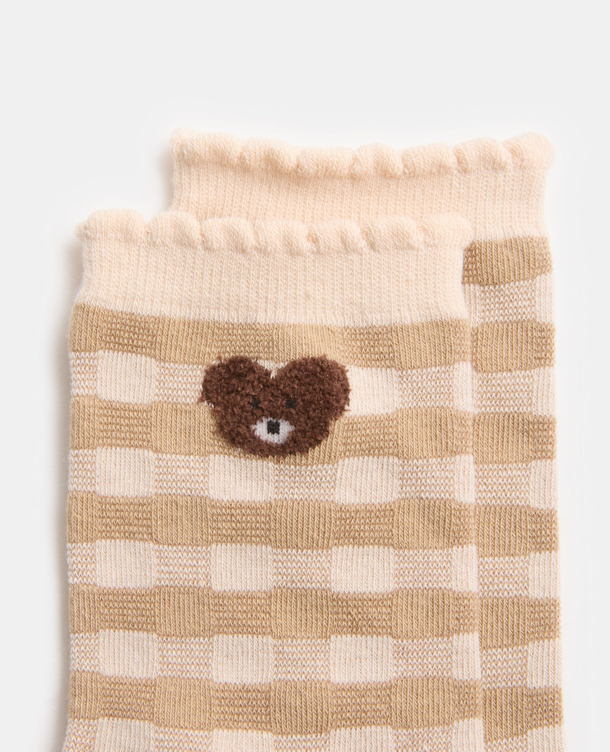 Paire de chaussettes à carreaux avec ourson