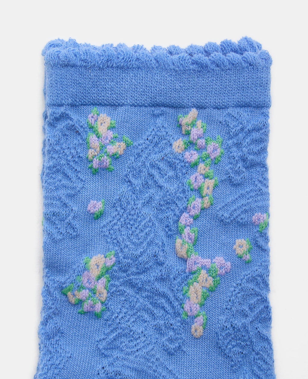 Paire de chaussettes avec fleurs et maille fantaisie