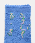 Paire de chaussettes avec fleurs et maille fantaisie