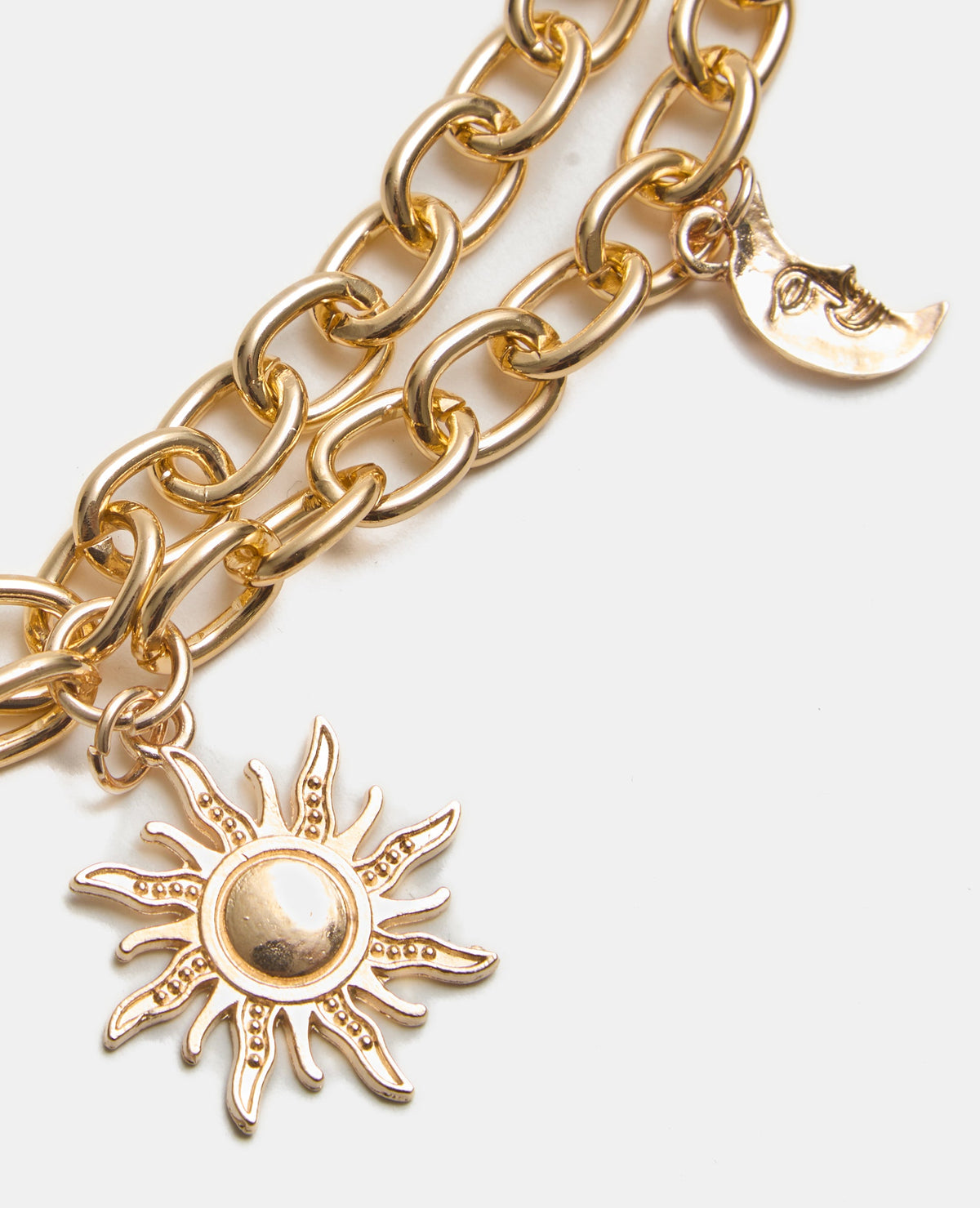Ceinture chaîne double rangée avec lunes, étoiles et soleils