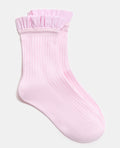 Paire de chaussettes avec froufrous rayés