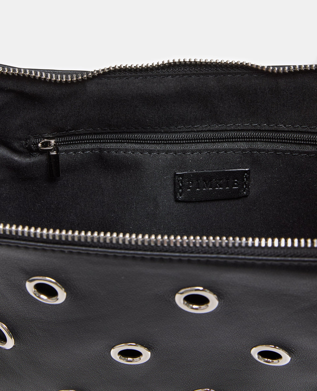 Sac porté épaule avec œillets métalliques