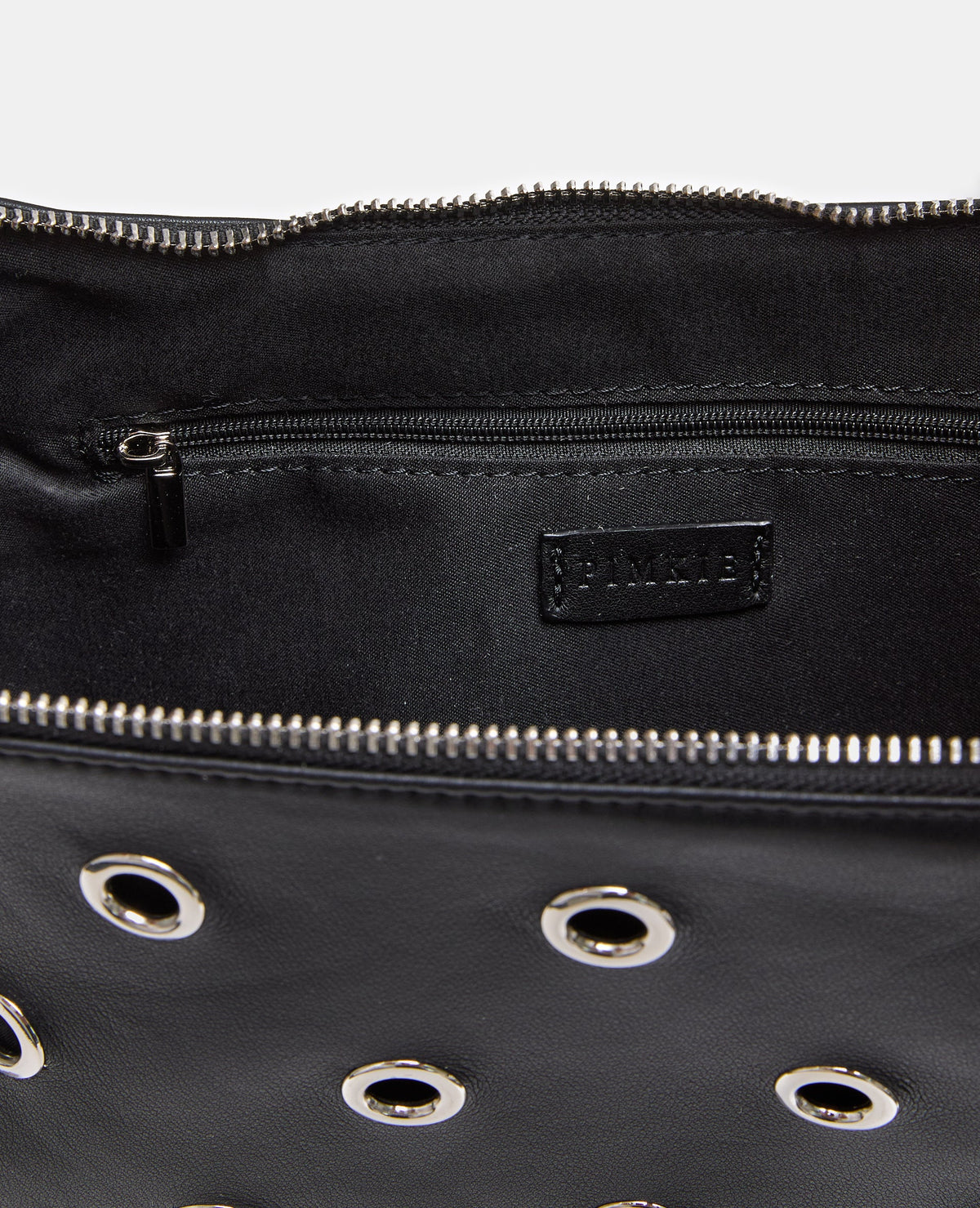 Sac porté épaule avec œillets métalliques