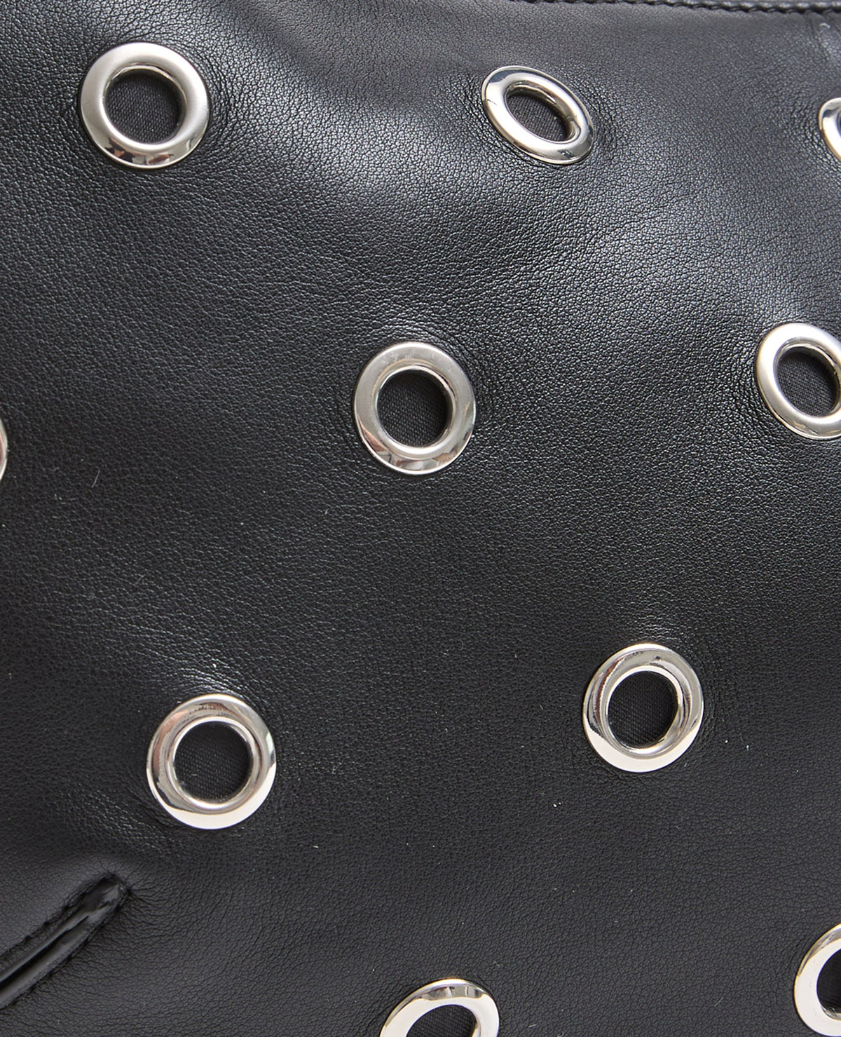 Sac porté épaule avec œillets métalliques
