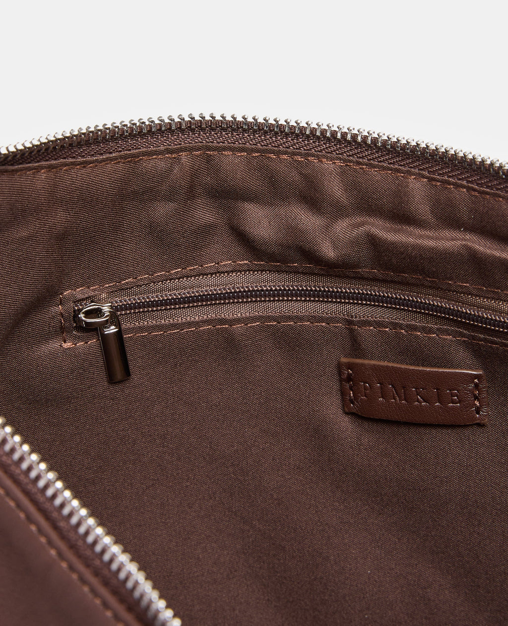 Sac porté épaule avec œillets métalliques
