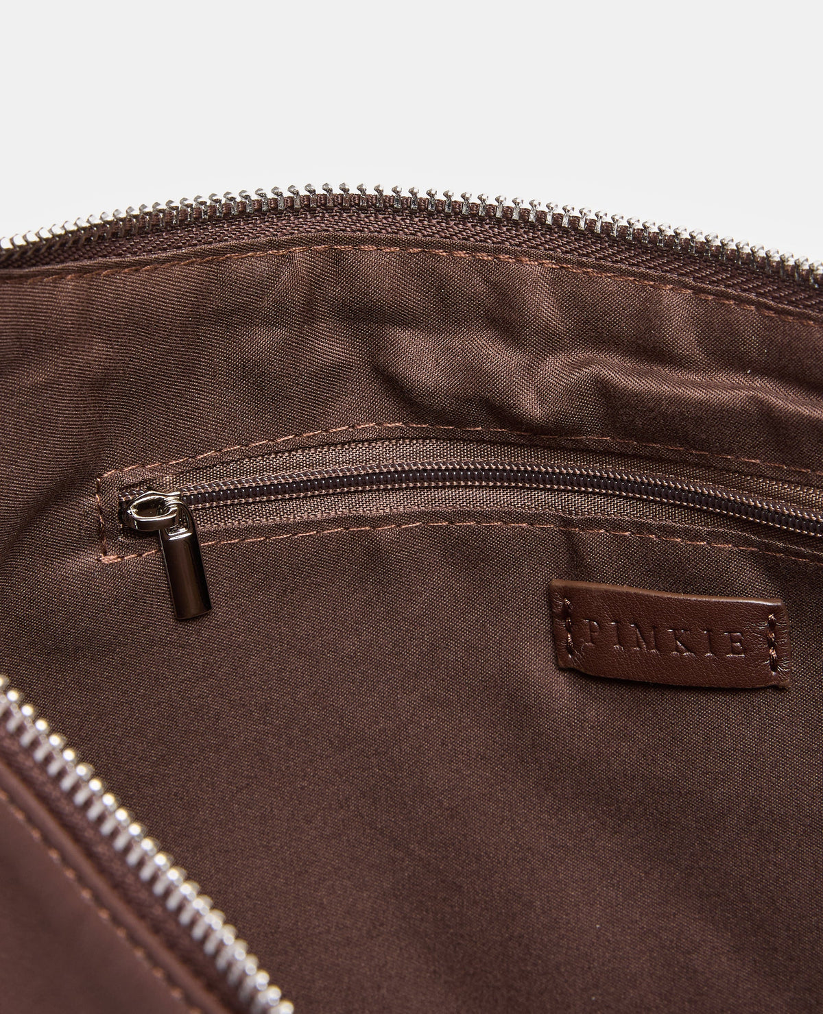 Sac porté épaule avec œillets métalliques
