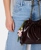 Déco de sac avec fleurs en simili