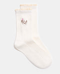 Paire de chaussettes avec chien brodé et dentelle