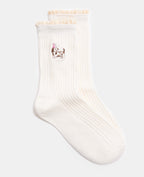 Paire de chaussettes avec chien brodé et dentelle