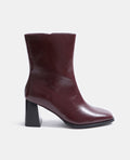 Boots à talons effet vinyl avec bouts carrés