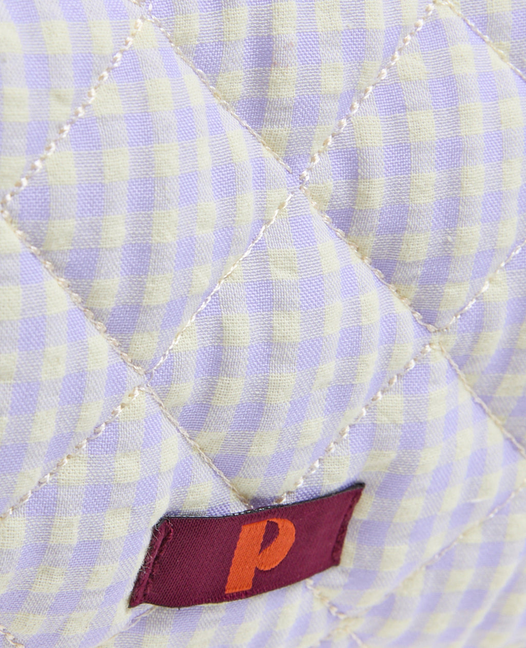 Trousse en tissu matelassé vichy avec volants