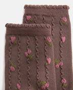 Paire de chaussettes avec fleurs