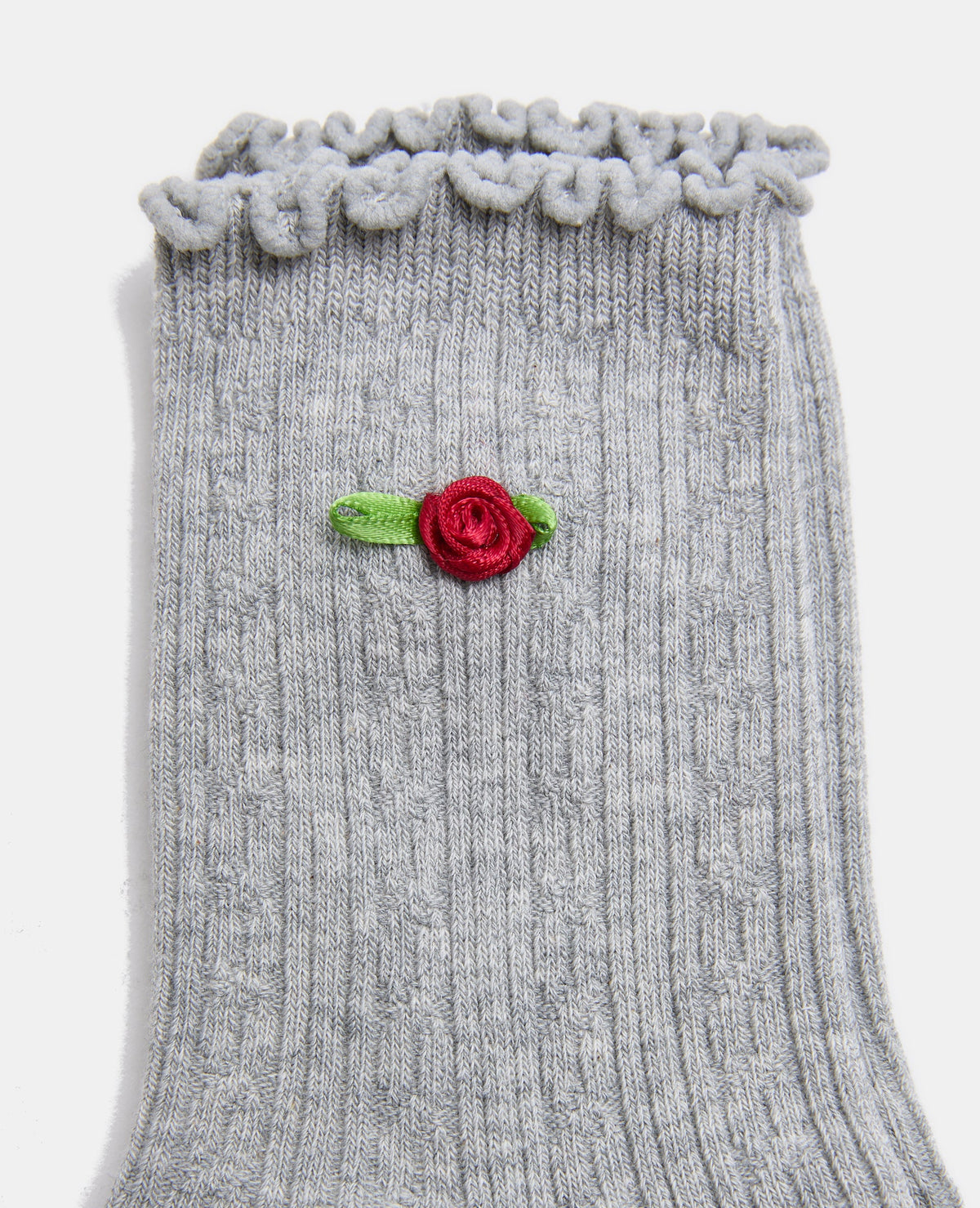 Paire de chaussettes en maille fantaisie avec roses