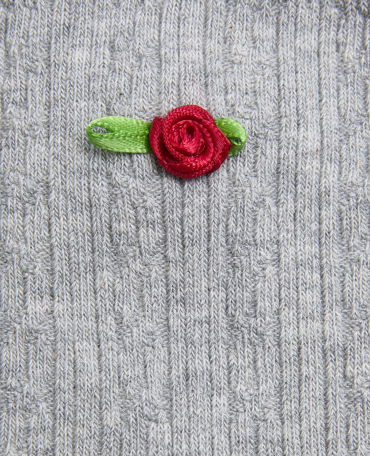 Paire de chaussettes en maille fantaisie avec roses