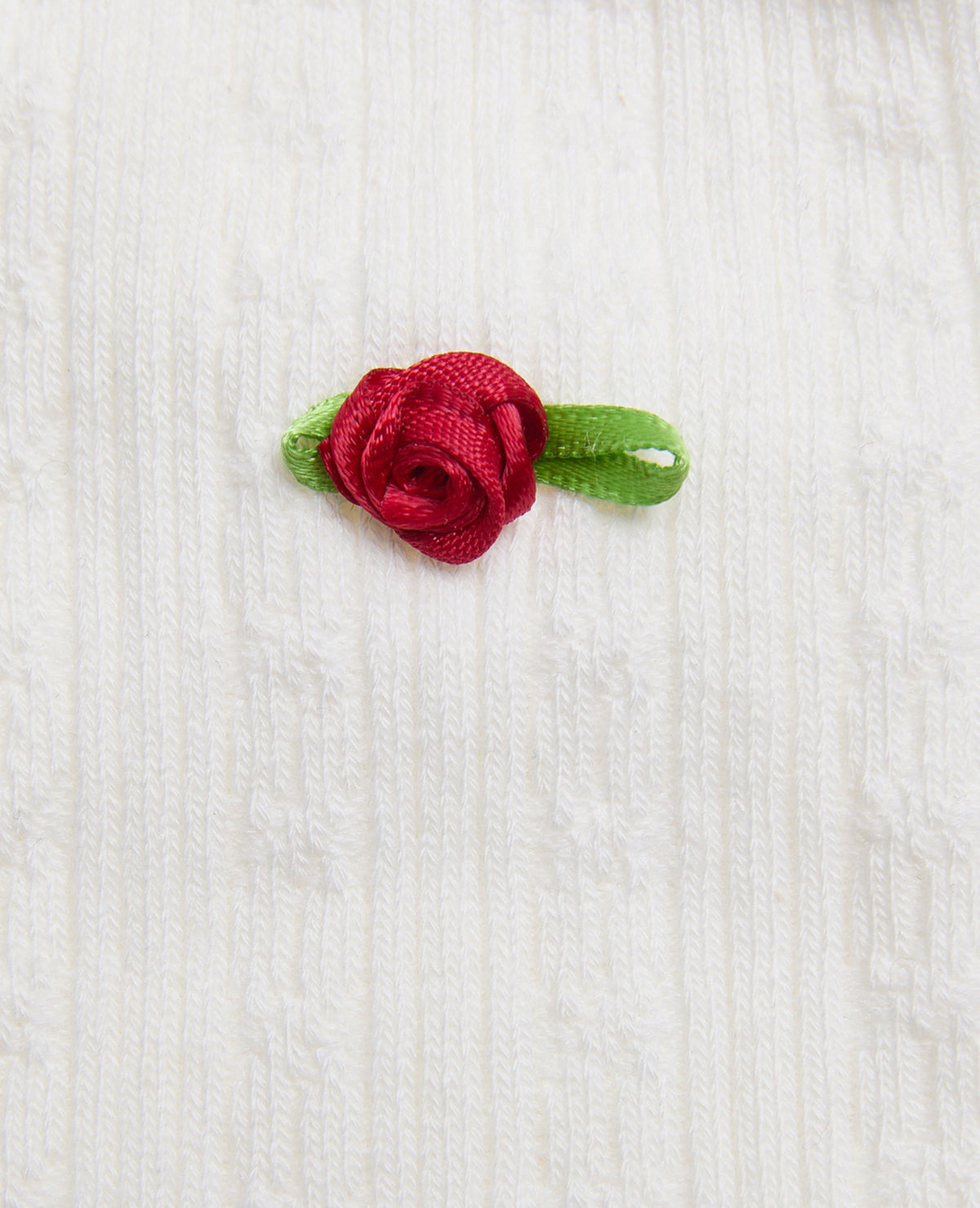 Paire de chaussettes en maille fantaisie avec roses