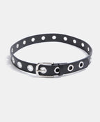 Ceinture en simili avec œillets métalliques