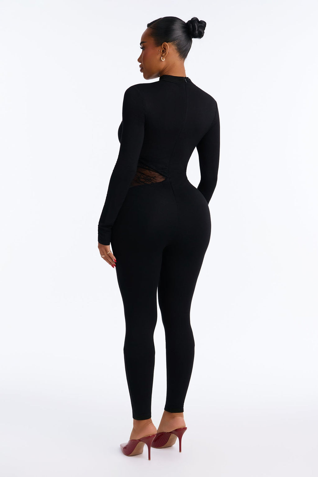 Combinaison moulante noire Sweetest Sin en dentelle ajourée